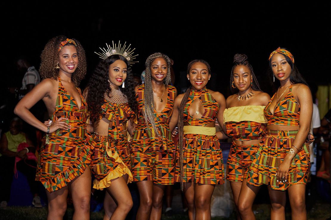 Festival attendees in matching Kente at Afrochella.