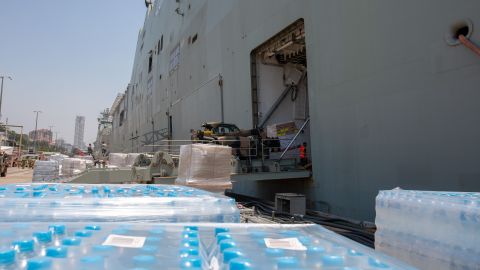 Supplies being loaded onto HMAS Adelaide to assist with the bushfire crisis.
