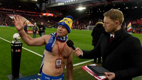 Liverpool put aside rivalries by inviting Everton fan Cullen onto the pitch at halftime of Merseyside derby clash in the third round of the FA Cup.