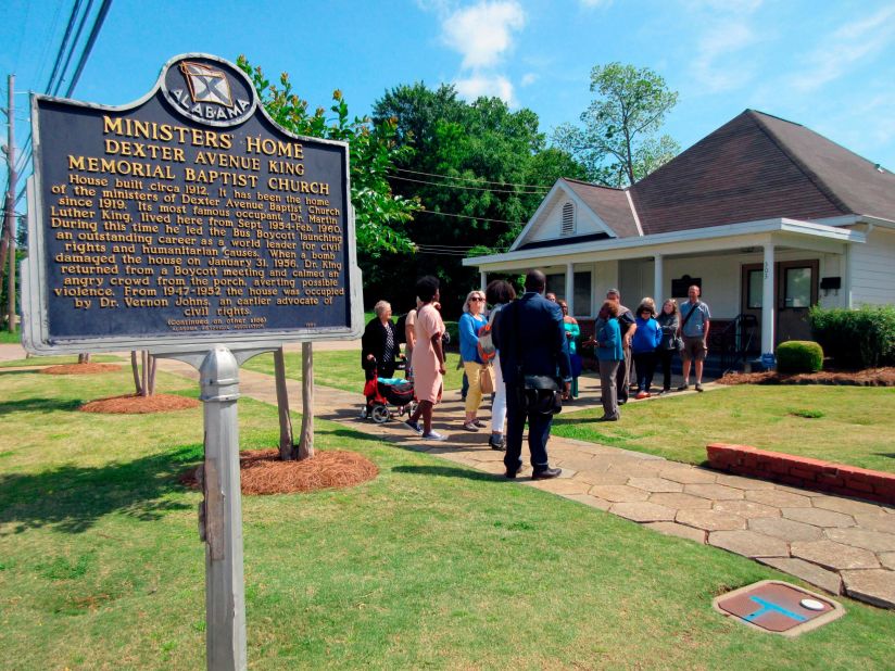 <strong>Dexter Parsonage Museum (Montgomery, Alabama):</strong> A tour group gathers in 2018 to see the house where King and his family lived while he served as pastor of Dexter. The house was bombed several times during his pastorship, but no one was injured during the attacks.