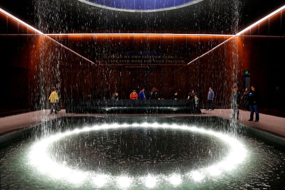<strong>National Museum of African American History and Culture (Washington):</strong> Water rains down from a cylindrical fountain as people visit the Contemplation Court at the museum. It's an ideal place to reflect on the dreams and goals that King had for his country.