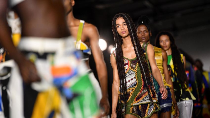 Models present creations from British designer Bethany Williams during a catwalk show on the first day of the Autumn/Winter 2020 London Fashion Week Men's, in London on January 4, 2020. (Photo by Ben STANSALL / AFP) (Photo by BEN STANSALL/AFP via Getty Images)