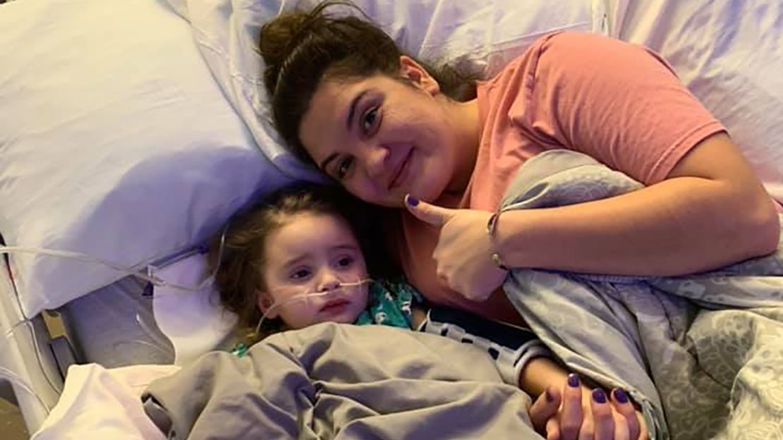 Jade DeLucia, with her mother Amanda Phillips, after regaining consciousness.