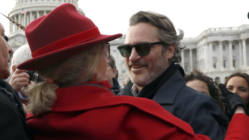 Actress and activist Jane Fonda hugs actor Joaquin Phoenix outside the U.S. Capitol during a protest on climate change Friday, Jan. 10, 2020, on Capitol Hill in Washington. (AP Photo/ Jacquelyn Martin)