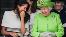 CHESTER, ENGLAND - JUNE 14:  Queen Elizabeth II sitts and laughs with Meghan, Duchess of Sussex during a ceremony to open the new Mersey Gateway Bridge on June 14, 2018 in the town of Widnes in Halton, Cheshire, England. Meghan Markle married Prince Harry last month to become The Duchess of Sussex and this is her first engagement with the Queen. During the visit the pair will open a road bridge in Widnes and visit The Storyhouse and Town Hall in Chester.  (Photo by Jeff J Mitchell/Getty Images)