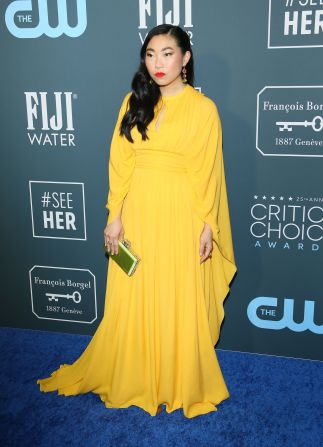 Awkwafina arrived in a vibrant yellow gown.