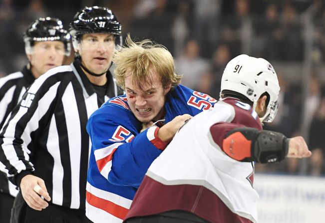 Colorado Avalanche center Nazem Kadri (91) fights with New York Rangers defenseman Ryan Lindgren (55) during the first period at Madison Square Garden on January 7, 2020 in New York.