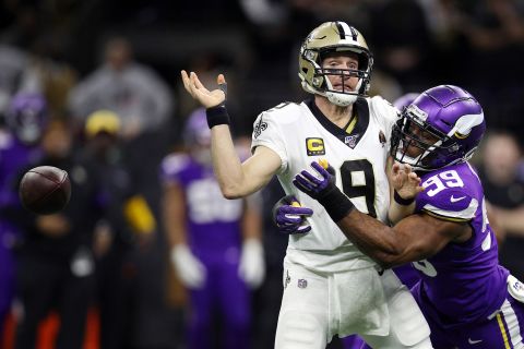 New Orleans Saints quarterback Drew Brees fumbles the ball following a sack by Minnesota Vikings defensive end Danielle Hunter during the NFC Wild Card Playoff game in New Orleans on Sunday, January 5. The Vikings defeated the Saints 26-20 in overtime. 