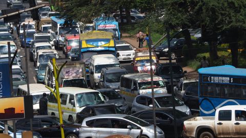 Matatus fighting through the traffic in Nairobi, Kenya.