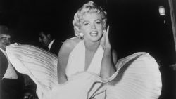 FILE - In this Sept. 9, 1954 file photo, Marilyn Monroe poses over the updraft of a New York subway grate while filming "The Seven Year Itch" New York. President Donald Trump has signed resolutions renaming two post offices in the Los Angeles area in honor of Monroe and rock 'n' roll legend Ritchie Valens. (AP Photo/Matty Zimmerman, File)