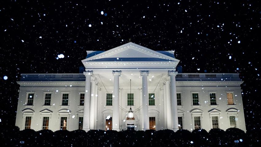 In this official White House photo, the North Portico of the White House is seen during a snow flurry Tuesday afternoon, January 7, 2020, in a mix of snow and rainy weather in Washington.
