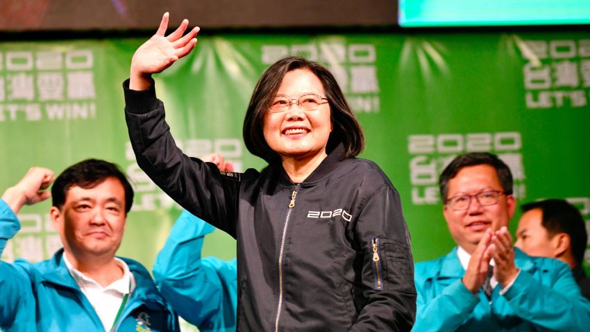 Taiwan's President Tsai Ing-wen (C) waves to supporters outside her campaign headquarters in Taipei on January 11, 2020. - President Tsai Ing-wen declared victory in Taiwan's election on January 11 as votes were being counted after an election battle dominated by the democratic island's fraught relationship with China. (Photo by Sam Yeh / AFP) (Photo by SAM YEH/AFP via Getty Images)