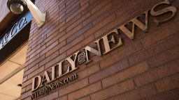 Signage for the New York Daily News is displayed on the facade of their Broad Street office, September 5, 2017 in New York City. 