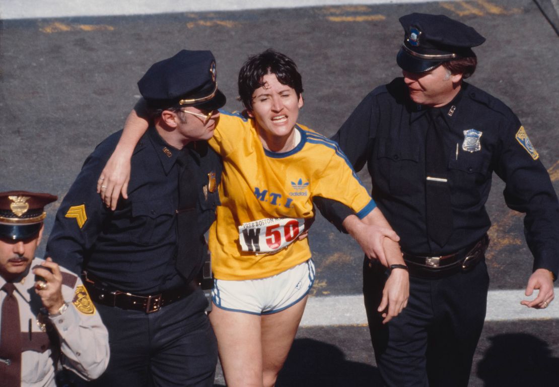 Rosie Ruiz is shown moments after crossing the finish line as the apparent women's race winner of the 84th Boston Marathon on April 21, 1980 in Boston.