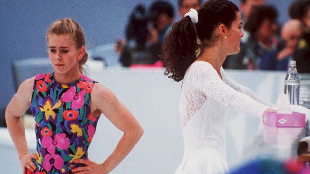 US figure skaters Tonya Harding, left, and Nancy Kerrigan avoid each other during a training session on February 17, 1994, during the Lillehammer Winter Olympics.