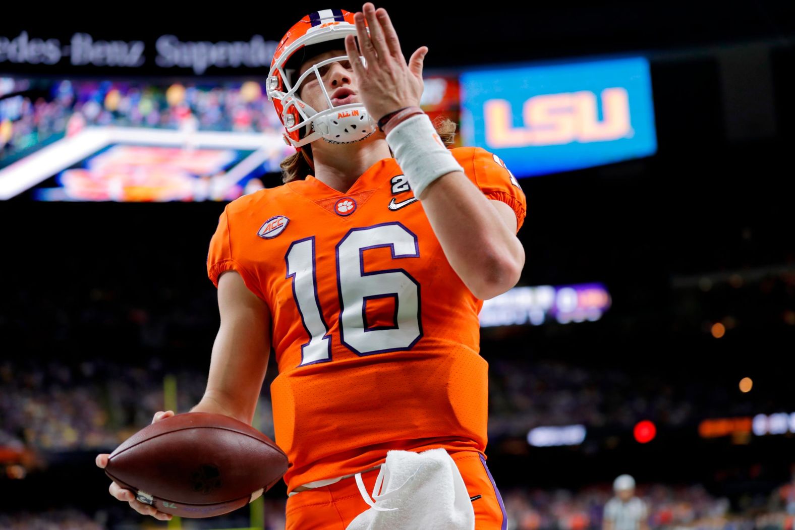 Lawrence blows a kiss after he opened the game's scoring with a short touchdown run.