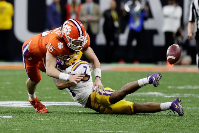 LSU safety Grant Delpit forces a late-game fumble by Clemson quarterback Trevor Lawrence in the College Football Playoff National Championship on Monday, January 13. The turnover essentially sealed the game for LSU.
