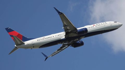 Delta's announcement tells passengers to ask flight attendants for assistnace. 