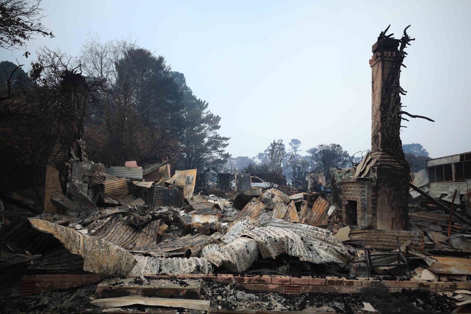 Debris remains where houses stood in the Australian village of Wingello on January 13.