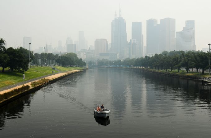 A smoky haze from bushfires hovers over the Melbourne skyline ahead of the <a href="index.php?page=&url=https%3A%2F%2Fwww.cnn.com%2Fvideos%2Fsports%2F2020%2F01%2F14%2Faustralian-open-air-quality-issues-fires-dalila-jakupovic-sharapova-tennis-spt-intl-lon-orig.cnn" target="_blank">Australian Open</a> tennis tournament on Tuesday, January 14. Poor air quality disrupted the qualifying rounds of the tournament.