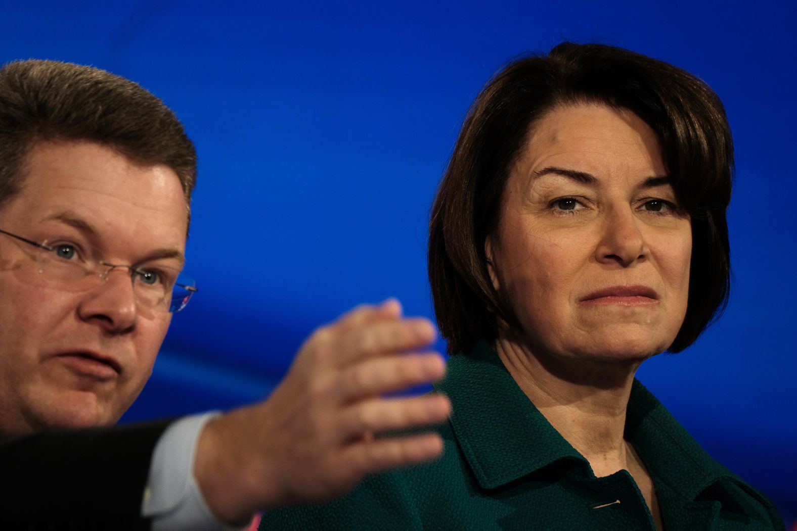 Klobuchar is shown around the stage before the debate.