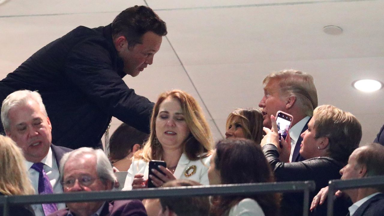 Actor Vince Vaughn greets first lady Melania Trump and President Donald Trump at the college football national championship game on Monday, January 13, 2020. 
