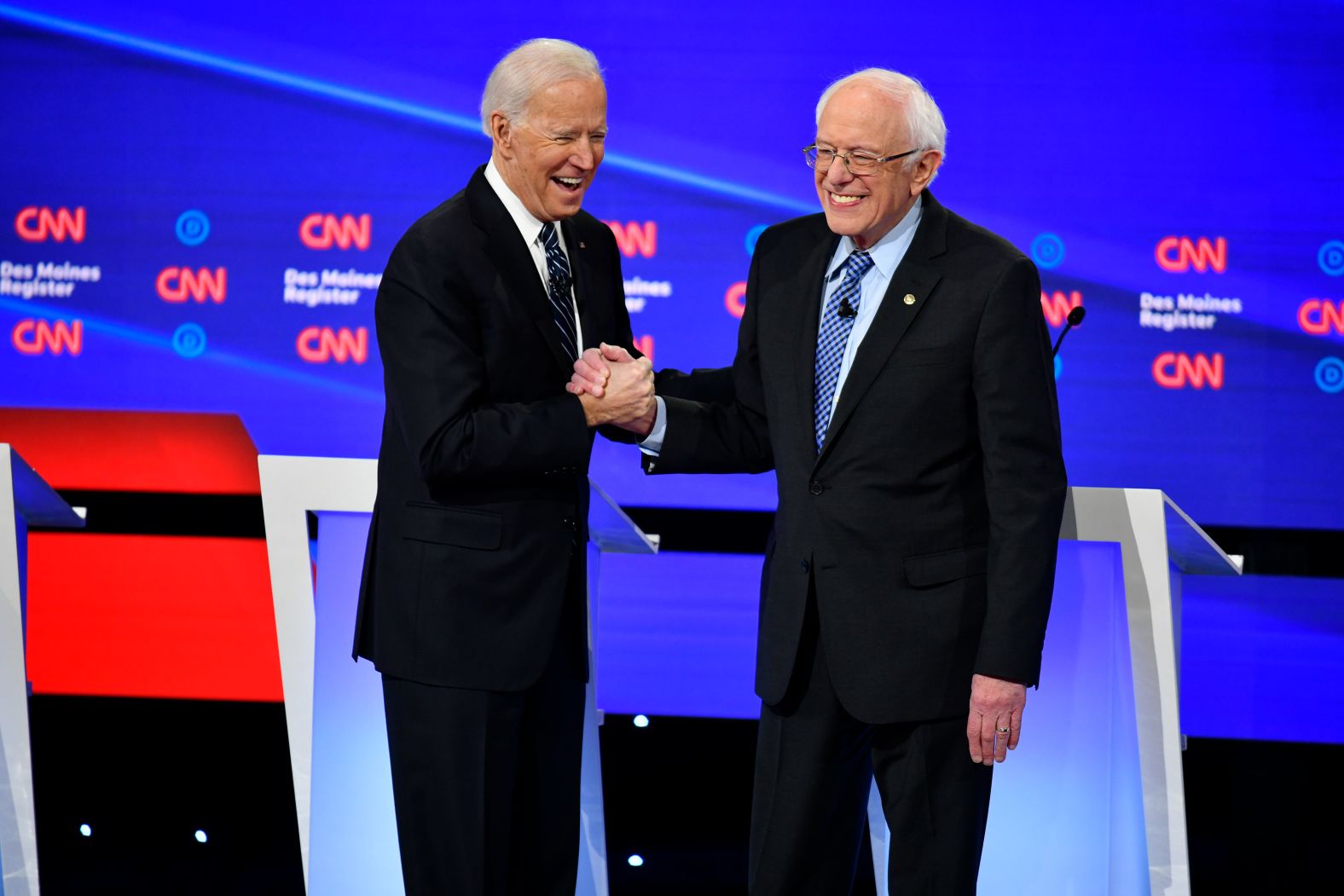 Biden and Sanders shake hands at the beginning of the debate.