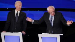 DES MOINES, IOWA - JANUARY 14:  Former Vice President Joe Biden (L)  listens as Sen. Bernie Sanders (I-VT) makes a point during the Democratic presidential primary debate at Drake University on January 14, 2020 in Des Moines, Iowa.  Six candidates out of the field qualified for the first Democratic presidential primary debate of 2020, hosted by CNN and the Des Moines Register.  (Photo by Scott Olson/Getty Images)