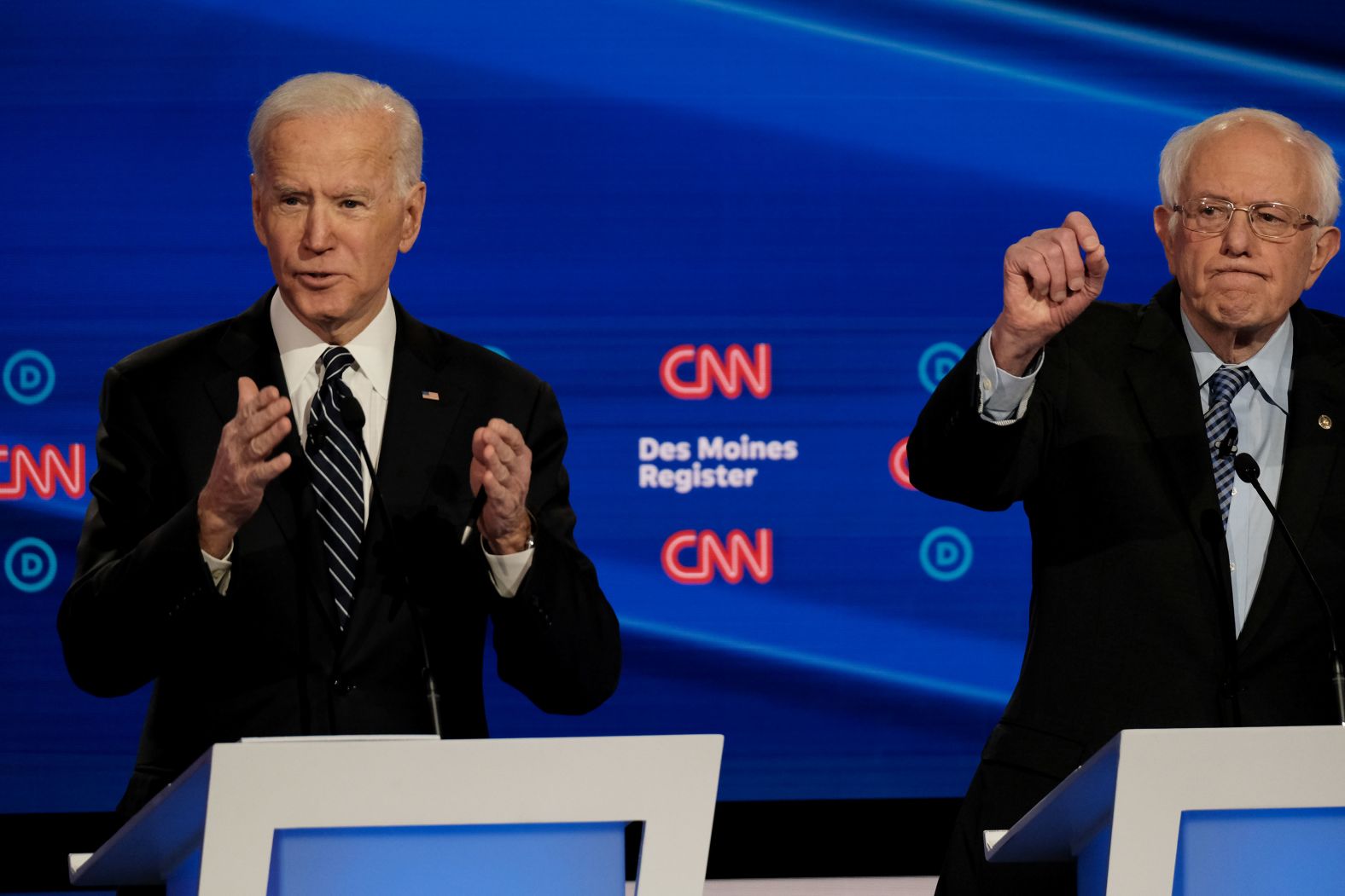 Biden answers a question as Sanders looks to be called on. Sanders leads a tight race in Iowa right now, according to the new <a href="index.php?page=&url=https%3A%2F%2Fwww.cnn.com%2F2020%2F01%2F10%2Fpolitics%2Fiowa-poll-democrats-2020%2Findex.html" target="_blank">CNN/Des Moines Register/Mediacom poll.</a> Biden, the national front-runner, is part of a tightly bunched top tier.