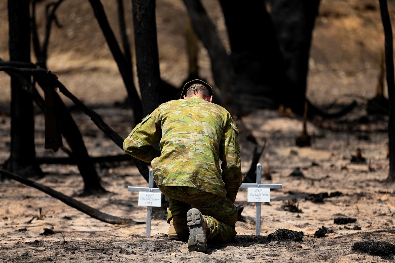 Lt. Kynan Lang from the 10th/27th Battalion visits the scene where his uncle and cousin died in a bushfire on Australia's Kangaroo Island. 