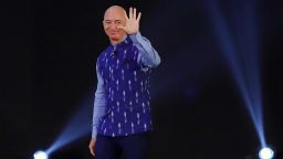Jeff Bezos, founder and chief executive officer of Amazon.com Inc., waves during the opening session of Amazon Sambhav event in New Delhi, India, on Wednesday, Jan. 15, 2020.