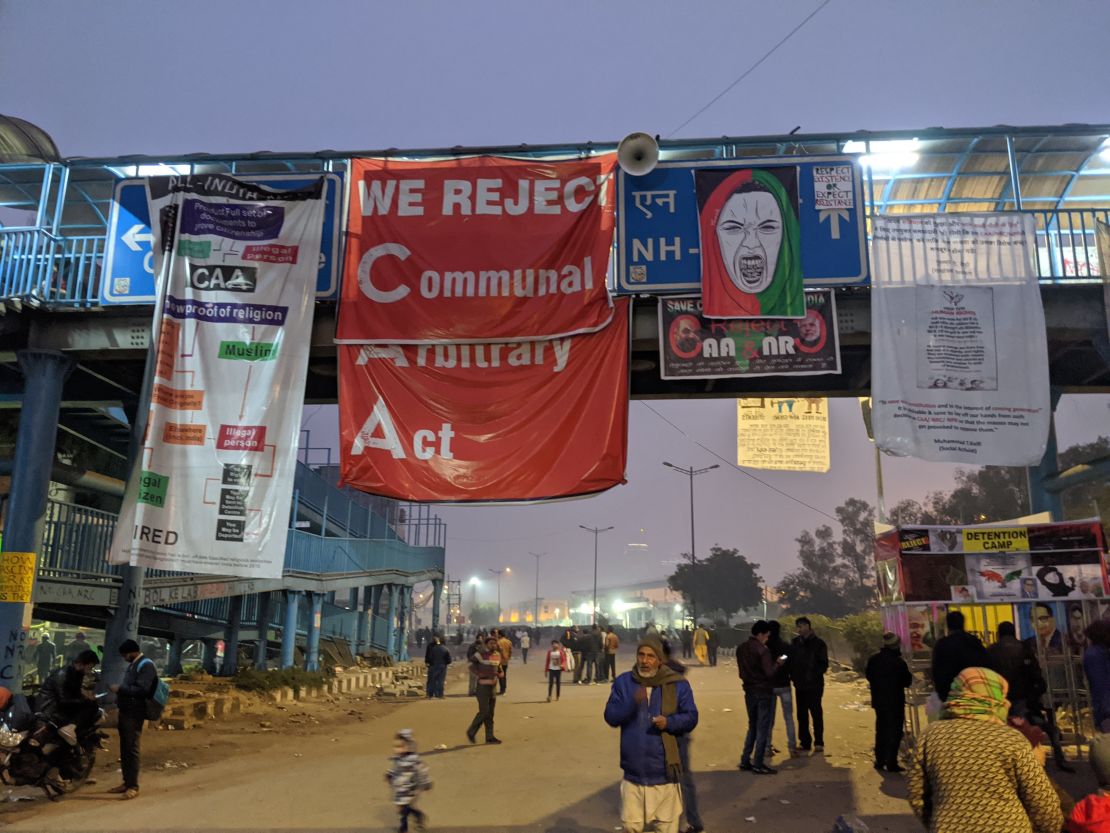 Posters against the Citizenship Amendment Act (CAA) hang from an overpass in Shaheen Bagh, New Delhi, on January 13, 2020.