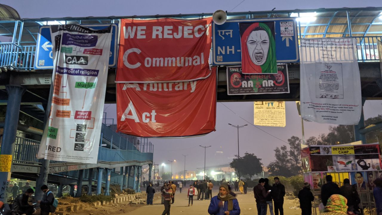 Posters against the Citizenship Amendment Act (CAA) hang from an overpass in Shaheen Bagh, New Delhi, on January 13, 2020.