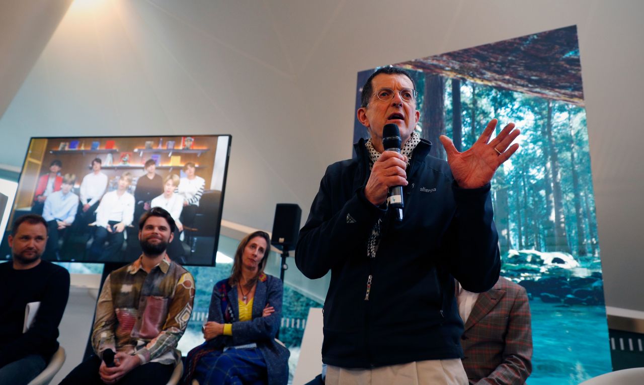 British artist Antony Gormley speaks as a monitor live-streams South Korean boyband BTS during the launch of the global public art project "Connect, BTS," at Serpentine Gallery in London on January 14, 2020.