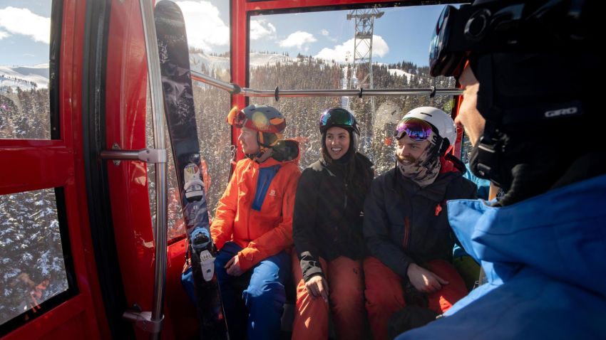 Skiiers ride the Peak 2 Peak gondola, a 4.4 kilometers aerial tram at Whistler Blackcomb Resort. 