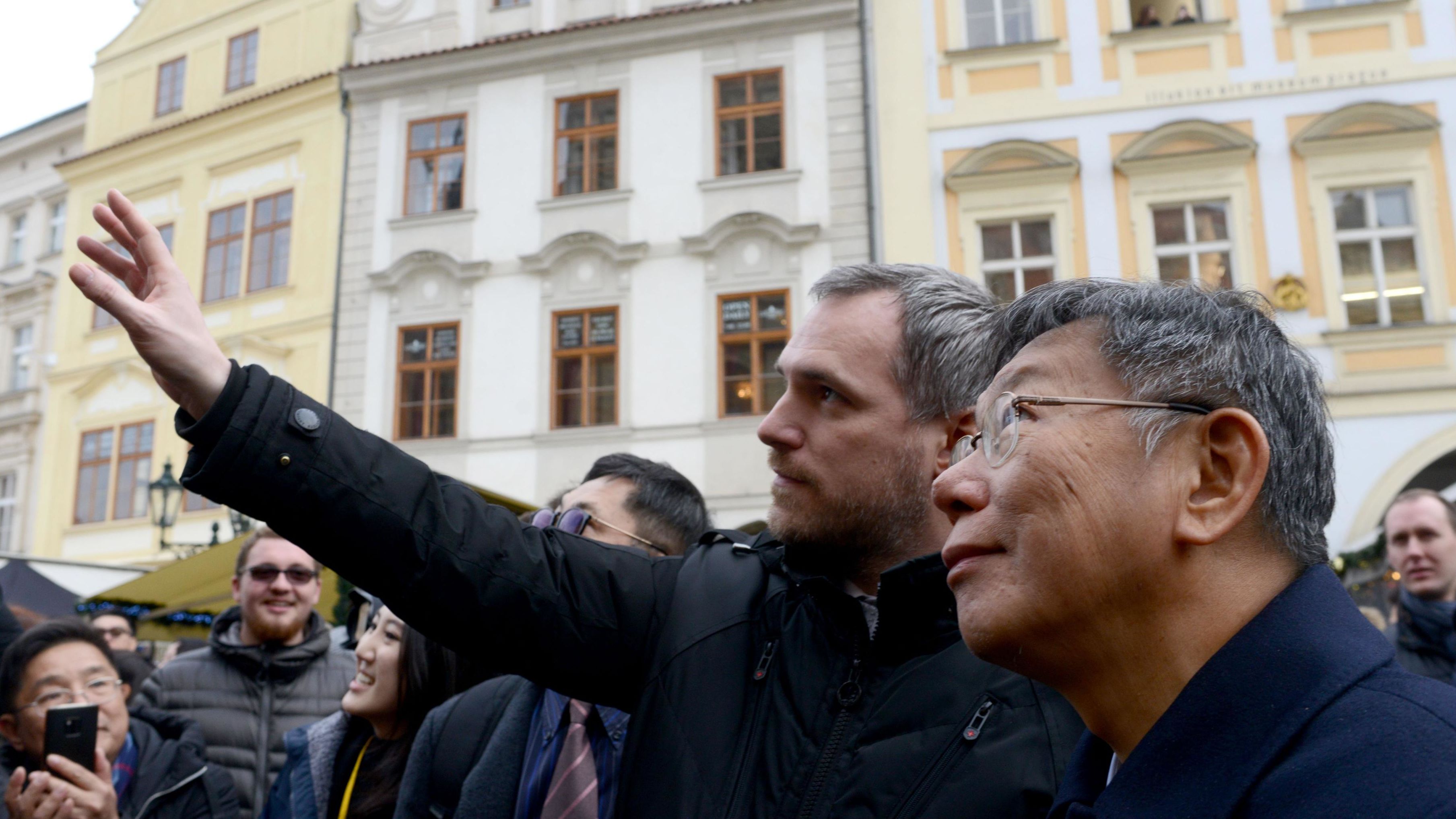 The mayors of Prague and Taipei walk through Prague's Old Town Square on January 13, 2020.