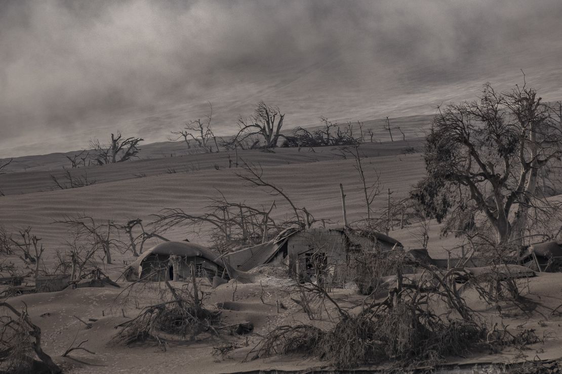 Houses near Taal volcano's crater are seen buried in volcanic ash from the eruption.