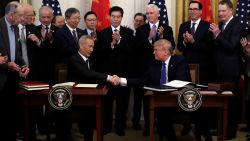 President Donald Trump shakes hands with Chinese Vice Premier Liu He, after signing a trade agreement in the East Room of the White House, Wednesday, Jan. 15, 2020, in Washington. (AP Photo/Evan Vucci)