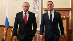 Russian President Vladimir Putin and Prime Minister Dmitry Medvedev walk before a meeting with members of the government in Moscow on January 15, 2020. - The Russian government resigned on Wednesday after President Vladimir Putin proposed a series of constitutional reforms, Russian news agencies reported. Prime Minister Dmitry Medvedev said the proposals would make significant changes to the country's balance of power and so "the government in its current form has resigned." (Photo by Dmitry ASTAKHOV / SPUTNIK / AFP) (Photo by DMITRY ASTAKHOV/SPUTNIK/AFP via Getty Images)