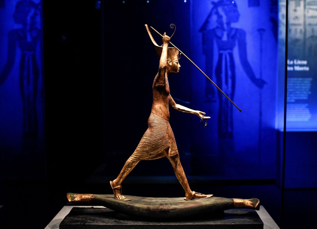A statuette of Tutankhamun is displayed during the exhibition's visit to Paris.