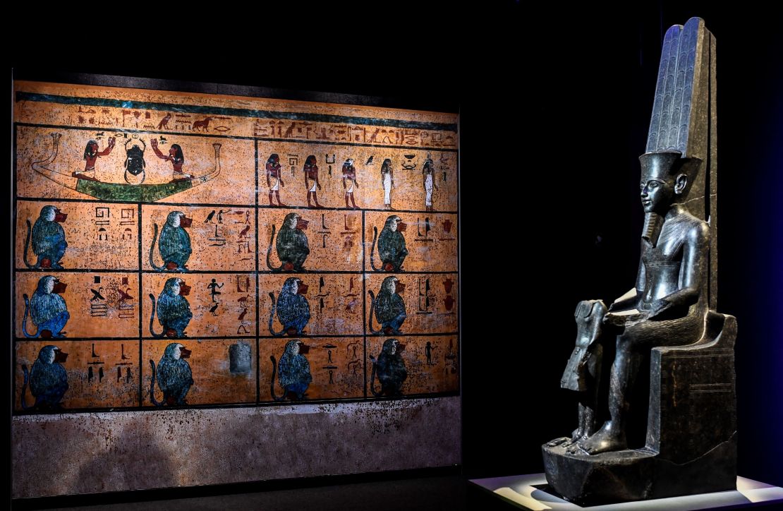 A sculpture of ancient Egyptian deity Amun is displayed during the exhibition's visit to Paris.