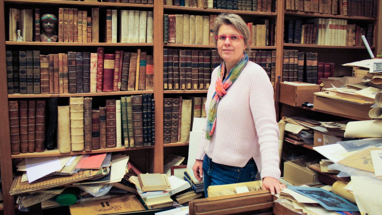 <strong>Family ties:</strong> Sascha Kok, 49, moved to the red-light district after visiting regularly as a child and now helps to run bookshop Antiquariaat A. Kok & Zn. B.V, which her family owns.