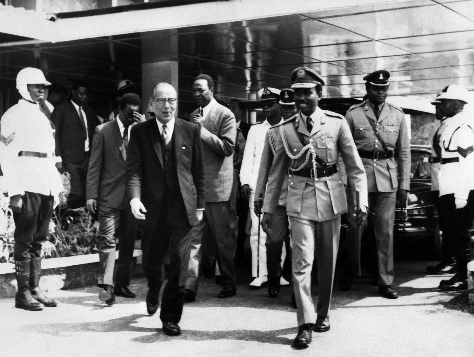 Gen. Yakubu Gowon, right, welcomes UN Secretary-General U Thant, left, as he arrives in Lagos to hold talks about the refugee crisis in the aftermath of the Biafran conflict on January 19, 1970.