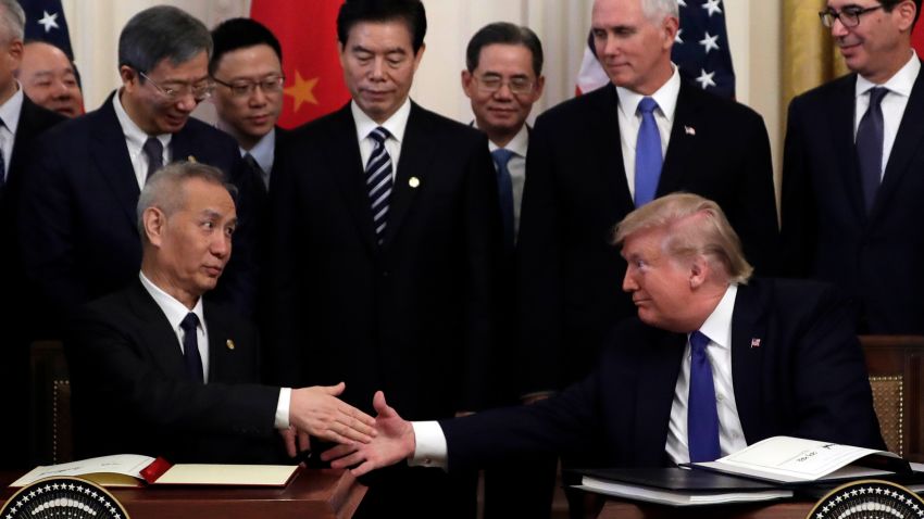 President Donald Trump shakes hands with Chinese Vice Premier Liu He, after signing a trade agreement in the East Room of the White House, Wednesday, Jan. 15, 2020, in Washington. (AP Photo/Evan Vucci)
