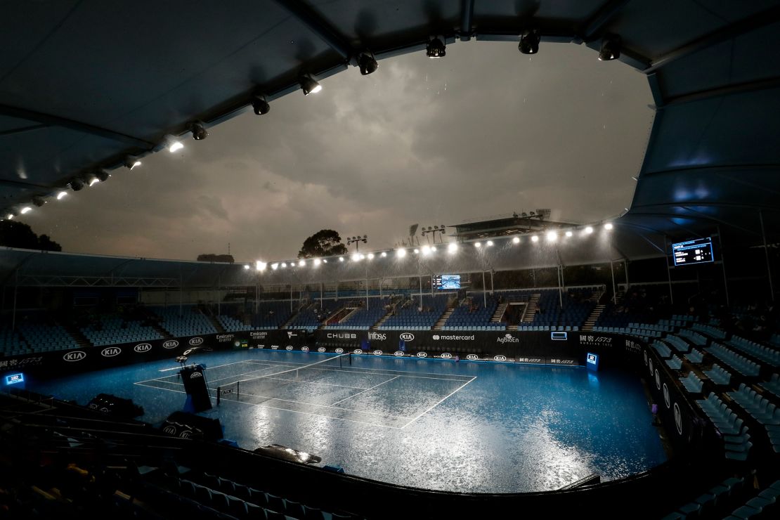 Heavy rain falls ahead of the 2020 Australian Open at Melbourne Park on January 15, 2020.