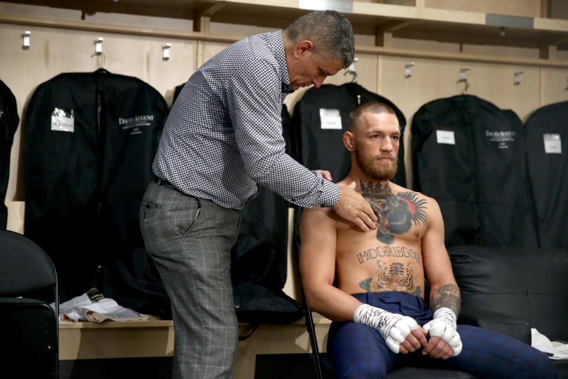 McGregor warms up in his locker room prior to his super welterweight boxing match against Floyd Mayweather Jr.