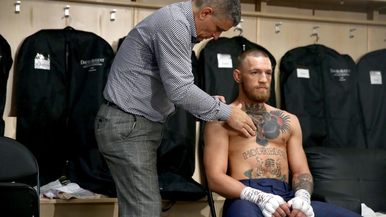 McGregor warms up in his locker room prior to his super welterweight boxing match against Floyd Mayweather Jr.