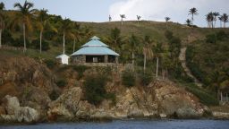 A building stands on Little St. James Island, owned by fund manager Jefferey Epstein, in St. Thomas, U.S. Virgin Islands, on Wednesday, July 10, 2019. This is where Epstein - convicted of sex crimes a decade ago in Florida and now charged in New York with trafficking girls as young as 14 - repaired, his escape from the toil of cultivating the rich and powerful. Photographer: Marco Bello/Bloomberg via Getty Images