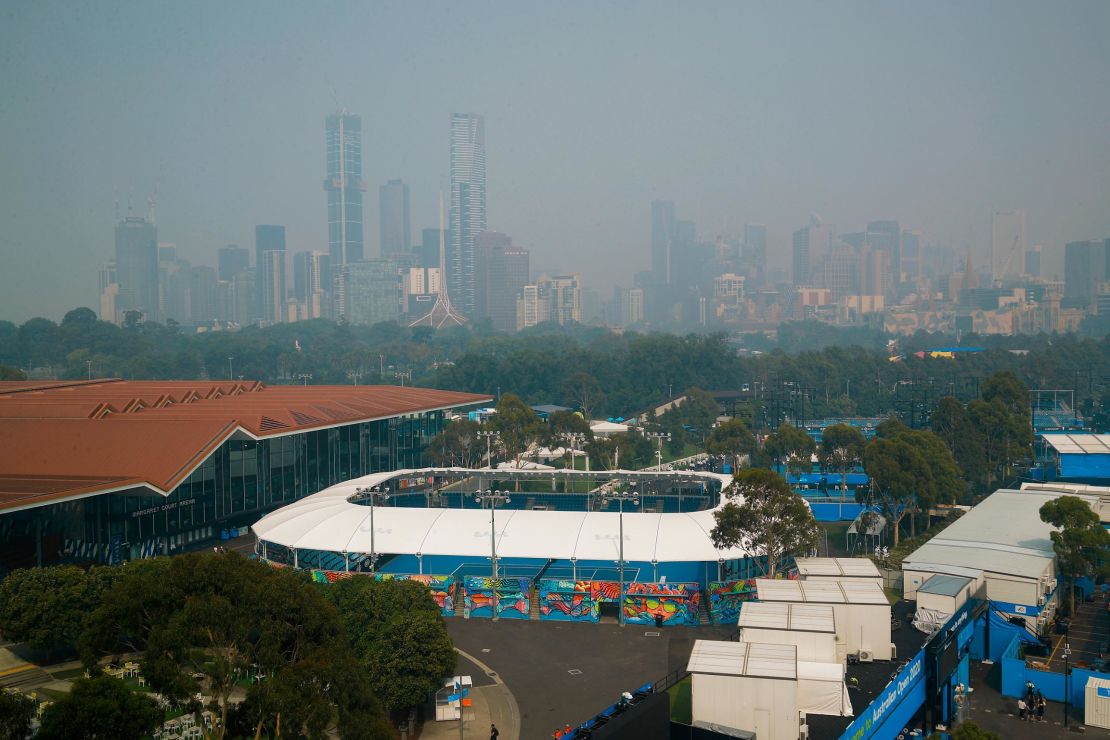 Smoke from the bush fires shrounds Melbourne Park ahead of the Australian Open.