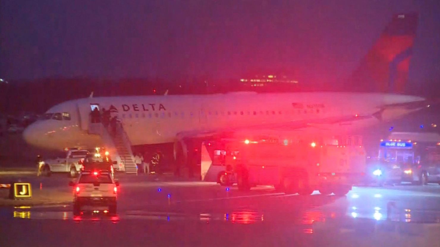 A Delta flight slid off the runway Friday at Kansas City International Airport, an airport spokesman said.